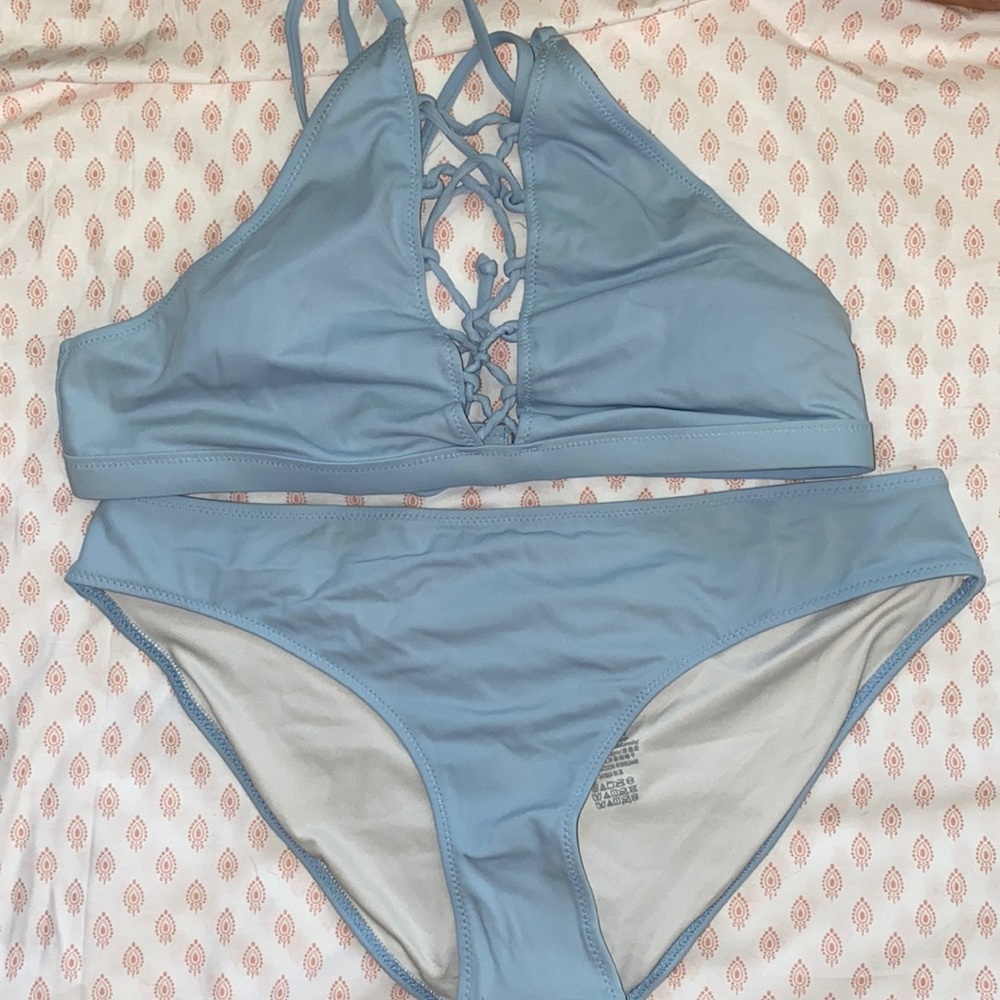 High neck, low waisted baby blue bikini.